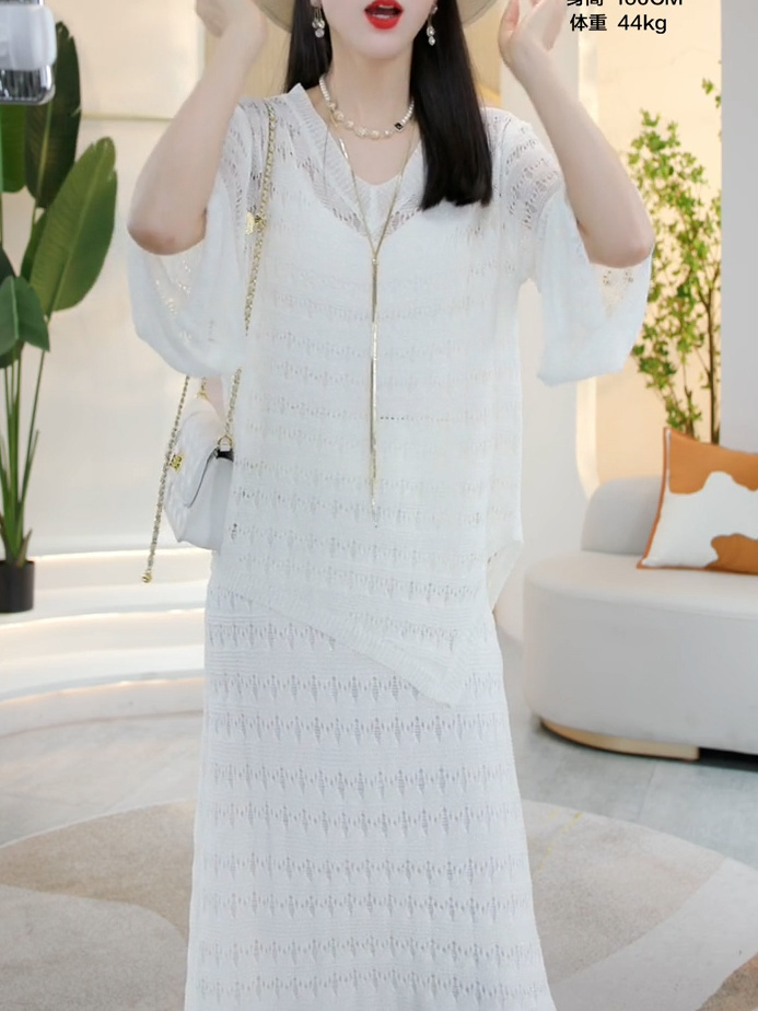 French niche light luxury design sense irregular hollow knitting + straight skirt two-piece set 2023 summer new style
