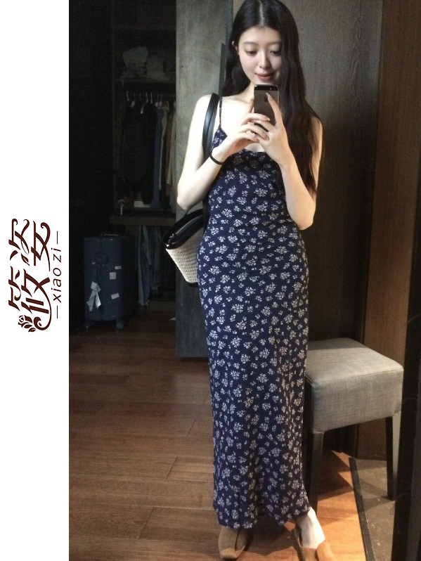 Xiaozi backless seaside holiday floral suspender dress design sense floral temperament women's high-end skirt