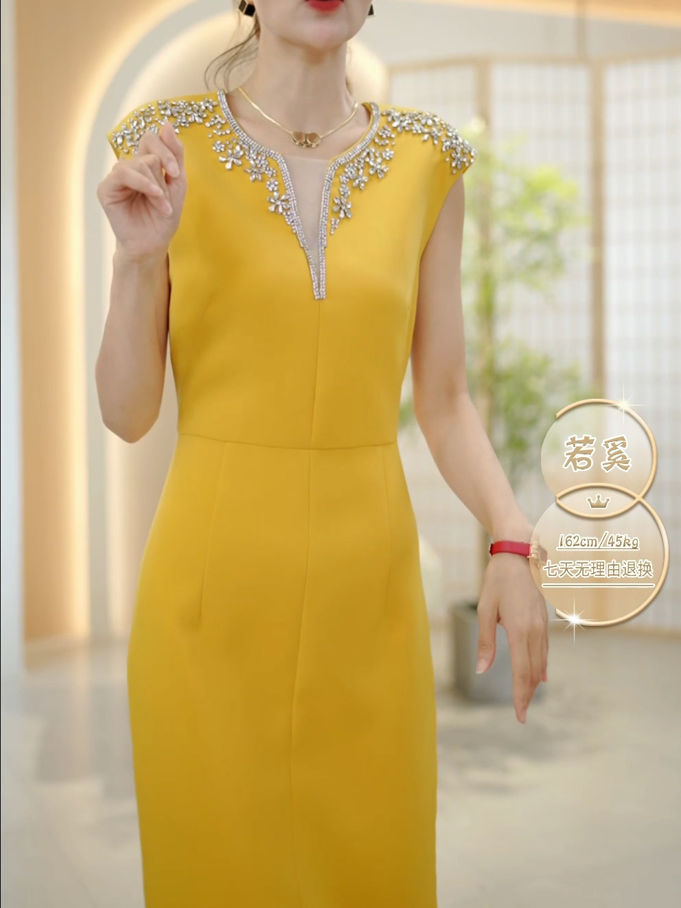 2023夏季新款裙子女裝氣質顯瘦不規則裙子V領重工釘珠黃色連衣裙