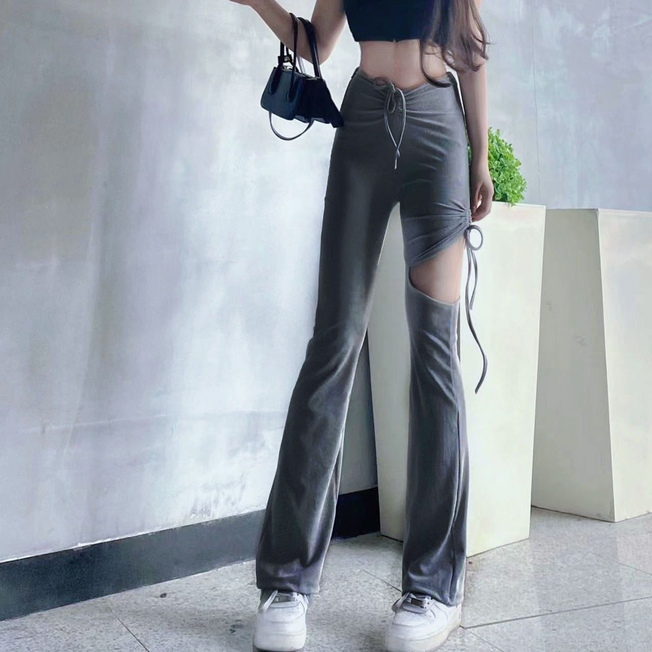 Design sense micro flared tie hollow casual pants women's summer  new trousers high waist slim flared pants
