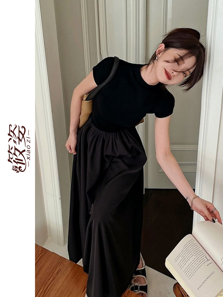 Xiaozi French stitching short-sleeved black dress female Korean version of the new a-line large swing skirt long waist waist small black dress