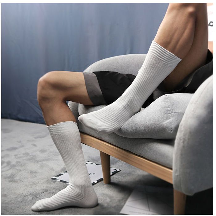 Men's spring and summer black and white high long socks all-match tide solid color college style cotton business gentleman breathable sweat