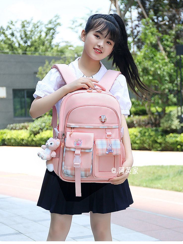 The new schoolbag female primary school students sixth grade campus girl backpack ultra-light weight reduction spine protection junior high school students backpack