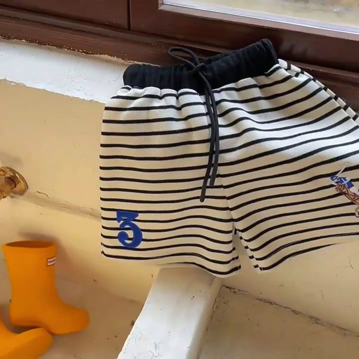 Cotton children's boys and girls 2023 summer new Korean striped stitching loose sports beach shorts