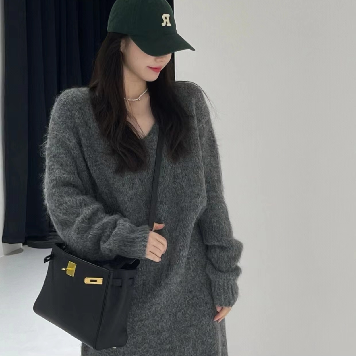 Autumn and winter large size loose lazy wind long knee sweater skirt female Korean version V-neck soft waxy advanced knitted dress