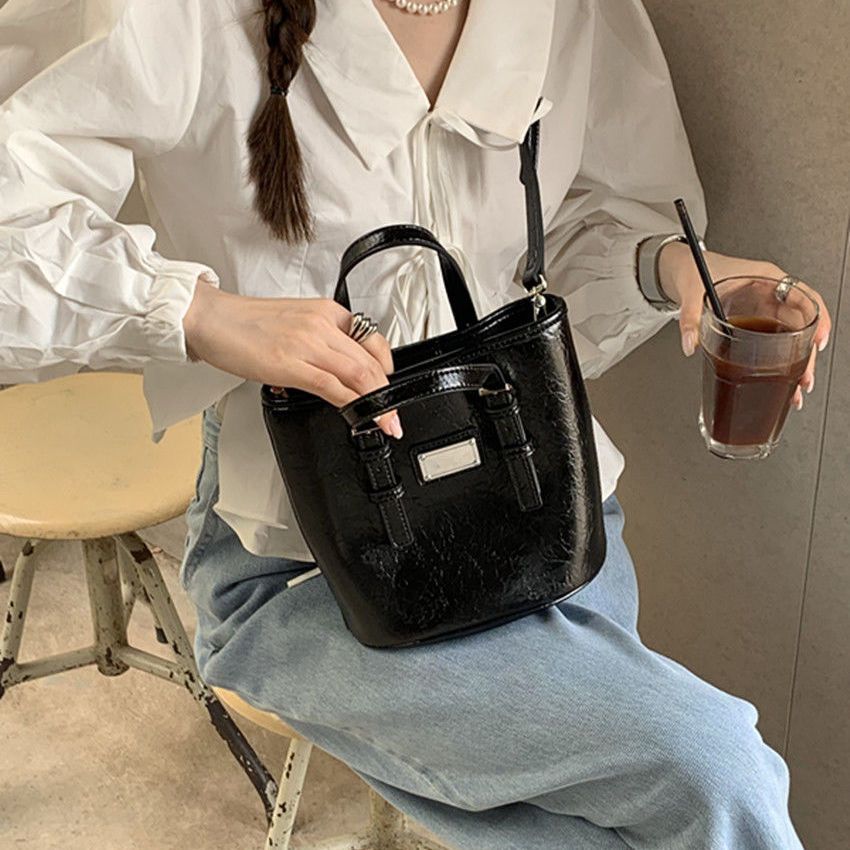 肥肥自製包包女2022春夏新款韓國ins小眾設計水桶手提單肩斜挎包