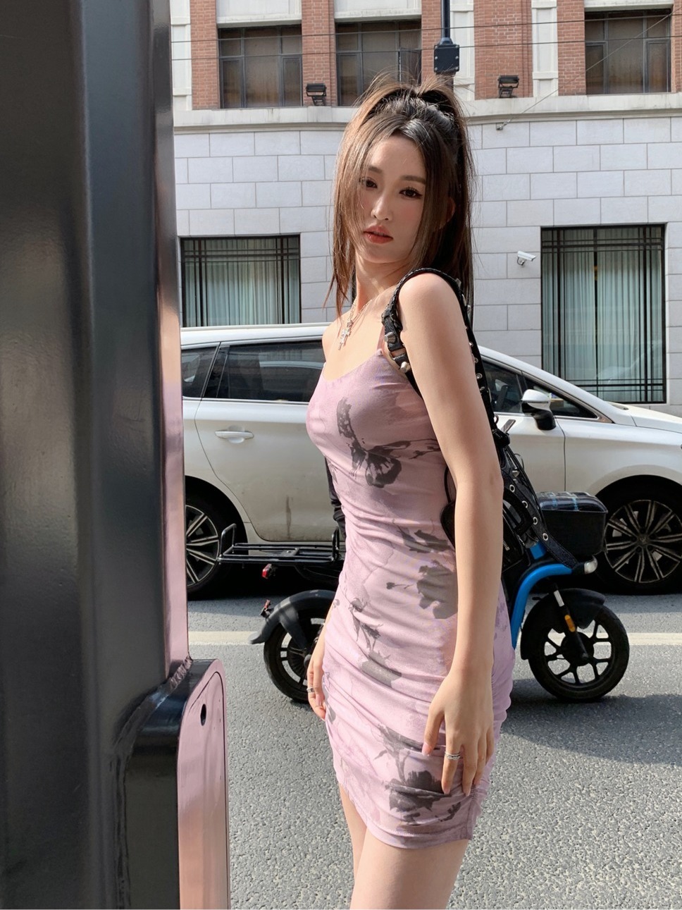 Xiaozi purple floral suspender skirt female self-cultivation was thin and small temperament bag hip dress female Korean version of the new